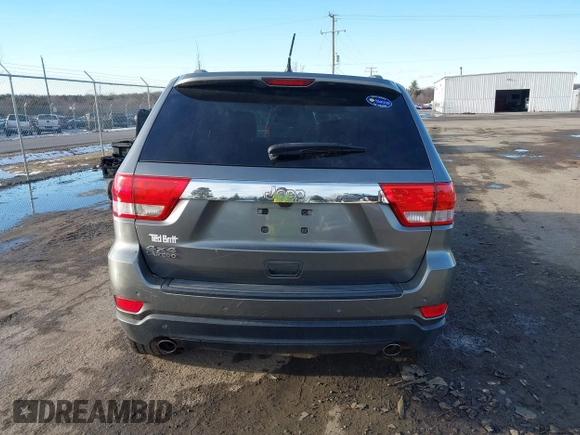 2011 Jeep Grand Cherokee 70th Anniversary with VIN 1J4RR4GT6BC715848, listed as a IAAI auction lot 41562152 with 119,910 mi miles. Bid and sale history available at carsss.com. Image 16.