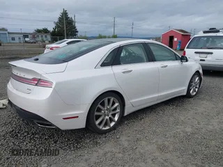 2015 Lincoln MKZ Hybrid with VIN 3LN6L2LUXFR606809, listed as a IAAI auction lot 41976918 with 169,999 mi miles and . Bid and sale history available at DreamBid. Image 4.