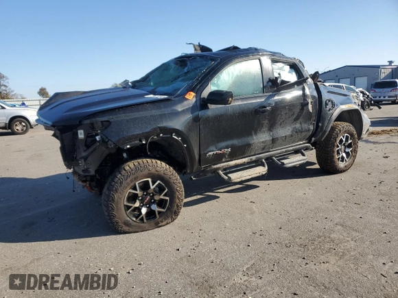 2024 GMC Canyon 4WD AT4X with VIN 1GTP6EEK2R1161994, listed as a Copart auction lot 75842154 with 0 mi miles and Salvage Title. Bid and sale history available at carsss.com. Image 1.