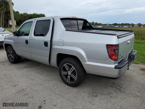 2014 Honda Ridgeline Sport with VIN 5FPYK1F76EB005713, listed as a Copart auction lot 74694724 with 73,039 mi miles and Salvage Title. Bid and sale history available at carsss.com. Image 2.