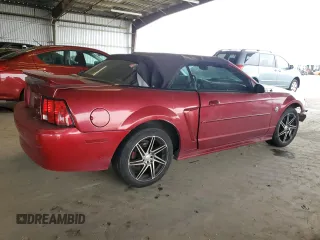 2004 Ford Mustang Deluxe z VIN 1FAFP44654F204619, wystawiony jako Copart lot #62414685 z przebiegiem 235 467 mil mil oraz Szkoda całkowita • Salvage title. Historia ofert i sprzedaży dostępna na DreamBid. Obrazek 3.