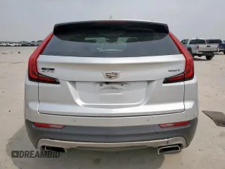 2020 Cadillac XT4 FWD Premium Luxury z VIN 1GYFZCR42LF115413, wystawiony jako Copart lot #56746785 z przebiegiem 41 296 mil mil oraz Szkody całkowita. Historia ofert i sprzedaży dostępna na DreamBid. Obrazek 6.