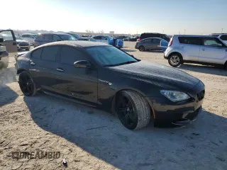 2015 BMW M6 z VIN WBS6C9C5XFD467952, wystawiony jako Copart lot #46312895 z przebiegiem 79 807 mil mil oraz Szkoda całkowita • Salvage title. Historia ofert i sprzedaży dostępna na DreamBid. Obrazek 4.