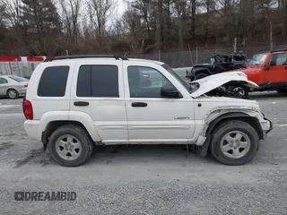 2004 Jeep Liberty Limited with VIN 1J4GL58K04W118653, listed as a IAAI auction lot 41369158 with 169,084 mi miles. Bid and sale history available at carsss.com. Image 13.
