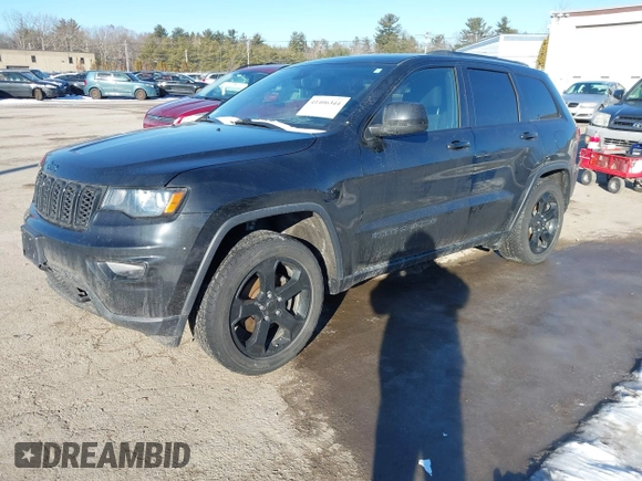 2018 Jeep Grand Cherokee Laredo E with VIN 1C4RJFAGXJC375588, listed as a IAAI auction lot 41406344 with 69,989 mi miles. Bid and sale history available at carsss.com. Image 2.