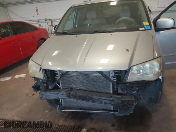 2012 Dodge Grand Caravan SXT with VIN 2C4RDGCG8CR139087, listed as a IAAI auction lot 41090171 with 202,461 mi miles and . Bid and sale history available at DreamBid. Image 6.