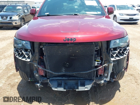 2019 Jeep Grand Cherokee Altitude with VIN 1C4RJFAG1KC619257, listed as a IAAI auction lot 42352249 with 72,562 mi miles and . Bid and sale history available at DreamBid. Image 6.