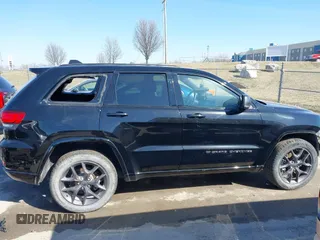 2021 Jeep Grand Cherokee 80th Anniversary with VIN 1C4RJFBG9MC745643, listed as a IAAI auction lot 41729989 with 88,567 mi miles and . Bid and sale history available at DreamBid. Image 14.