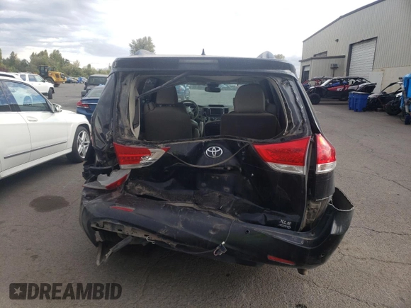 2011 Toyota Sienna XLE with VIN 5TDDK3DC1BS022039, listed as a Copart auction lot 71971634 with 121,100 mi miles and Salvage Title. Bid and sale history available at carsss.com. Image 6.