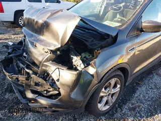2016 Ford Escape SE z VIN 1FMCU0G72GUA42592, wystawiony jako IAAI lot #41603556 z przebiegiem 109 582 mil mil oraz . Historia ofert i sprzedaży dostępna na DreamBid. Obrazek 6.