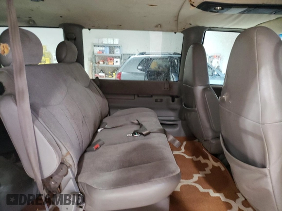 2001 Chevrolet Astro z VIN 1GNEL19W01B143781, wystawiony jako Copart lot #58476275 z przebiegiem 157 888 mil mil oraz Szkoda całkowita • Salvage title. Historia ofert i sprzedaży dostępna na DreamBid. Obrazek 11.