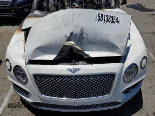 2017 Bentley Bentayga W12 z VIN SJAAC2ZV6HC015975, wystawiony jako Copart lot #58138354 z przebiegiem Nie podano mil oraz Nie do naprawy • Non repairable. Historia ofert i sprzedaży dostępna na DreamBid. Obrazek 12.