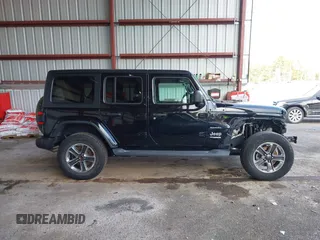 2019 Jeep Wrangler Unlimited Sahara with VIN 1C4HJXEG5KW532861, listed as a IAAI auction lot 41698912 with 121,278 mi miles and . Bid and sale history available at DreamBid. Image 14.