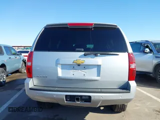 2013 Chevrolet Tahoe LT with VIN 1GNSKBE01DR157083, listed as a IAAI auction lot 41759189 with 153,403 mi miles and . Bid and sale history available at DreamBid. Image 17.