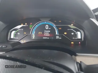 2018 Honda Clarity Plug-In Hybrid Touring with VIN JHMZC5F3XJC005797, listed as a IAAI auction lot 42021622 with 58,307 mi miles. Bid and sale history available at carsss.com. Image 7.