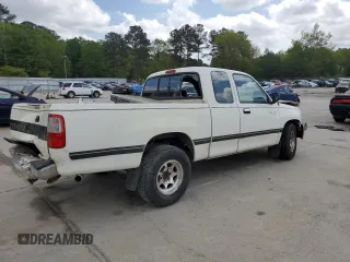 1995 Toyota T100 DX with VIN JT4VD12E2S0009844, listed as a Copart auction lot 51738525 with 357,475 mi miles and Salvage Title. Bid and sale history available at carsss.com. Image 3.
