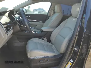 2023 Cadillac XT4 FWD Luxury z VIN 1GYAZAR46PF178003, wystawiony jako Copart lot #52024665 z przebiegiem 42 000 mil mil oraz Szkoda całkowita • Salvage title. Historia ofert i sprzedaży dostępna na DreamBid. Obrazek 7.