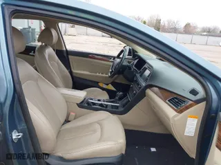 2016 Hyundai Sonata Hybrid Limited with VIN KMHE34L1XGA009748, listed as a IAAI auction lot 41848222 with 84,558 mi miles. Bid and sale history available at carsss.com. Image 5.