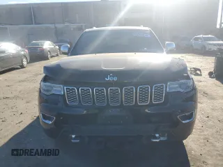 2017 Jeep Grand Cherokee Overland with VIN 1C4RJFCT7HC684746, listed as a Copart auction lot 83259314 with 106,848 mi miles and Salvage Title. Bid and sale history available at carsss.com. Image 5.