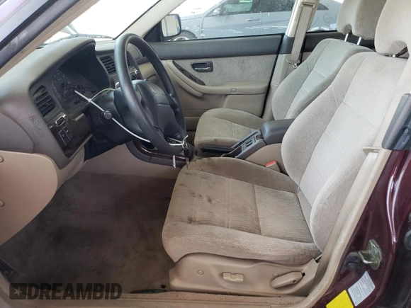 2000 Subaru Legacy Outback with VIN 4S3BH6654Y7673397, listed as a Copart auction lot 57311615 with 149,424 mi miles and Salvage title. Bid and sale history available at DreamBid. Image 7.