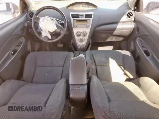 2012 Toyota Yaris with VIN JTDBT4K33C1416217, listed as a Copart auction lot 46714115 with 212,894 mi miles and Salvage Title. Bid and sale history available at DreamBid. Image 8.