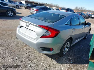 2017 Honda Civic Sedan LX with VIN 19XFC2F56HE069424, listed as a IAAI auction lot 40806146 with 71,084 mi miles. Bid and sale history available at carsss.com. Image 4.