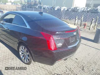 2017 Cadillac ATS Luxury AWD z VIN 1G6AH1RX3H0125723, wystawiony jako IAAI lot #42106626 z przebiegiem 174 119 mil mil oraz . Historia ofert i sprzedaży dostępna na DreamBid. Obrazek 3.