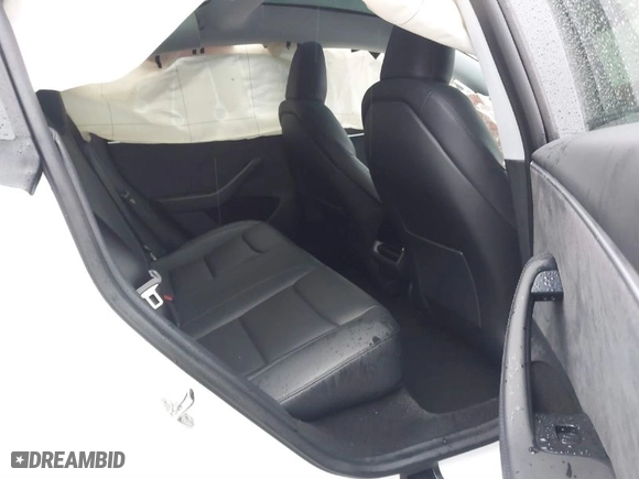 2024 Tesla Model 3 Long Range with VIN 5YJ3E1EB0RF812296, listed as a IAAI auction lot 41799217 with 6,990 mi miles. Bid and sale history available at carsss.com. Image 8.