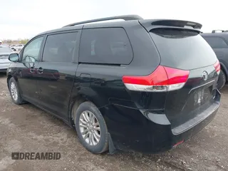 2011 Toyota Sienna XLE AAS with VIN 5TDYK3DC9BS071636, listed as a IAAI auction lot 41972332 with 204,477 mi miles and . Bid and sale history available at DreamBid. Image 3.