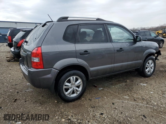 2009 Hyundai Tucson GLS with VIN KM8JM12B79U042597, listed as a Copart auction lot 52164465 with 90,943 mi miles and Salvage Title. Bid and sale history available at carsss.com. Image 3.