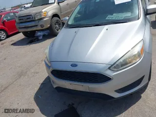 2016 Ford Focus SE with VIN 1FADP3K29GL269691, listed as a IAAI auction lot 42061051 with 100,692 mi miles. Bid and sale history available at carsss.com. Image 6.