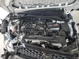 2023 Toyota Corolla Cross L z VIN 7MUAAAAG7PV053889, wystawiony jako Copart lot #61677525 z przebiegiem 27 970 mil mil oraz Szkoda całkowita • Salvage title. Historia ofert i sprzedaży dostępna na DreamBid. Obrazek 12.