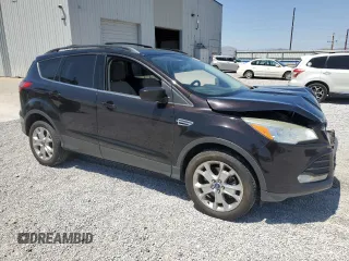 2013 Ford Escape SE с VIN 1FMCU9G91DUC25077, выставлен на аукционе Copart как лот 60888305 с пробегом 212 409 миль миль и Списание • Salvage title. История ставок и продаж доступна на DreamBid. Изображение 4.
