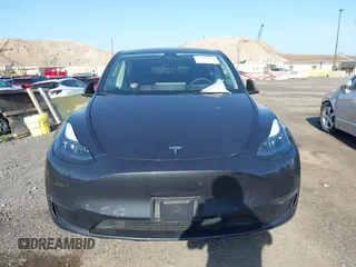 2024 Tesla Model Y z VIN 7SAYGDED8RF158878, wystawiony jako IAAI lot #42514586 z przebiegiem 18 594 mil mil oraz . Historia ofert i sprzedaży dostępna na DreamBid. Obrazek 12.