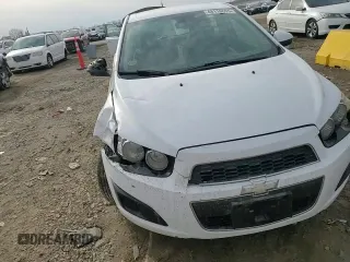 2013 Chevrolet Sonic LS z VIN 1G1JA6SHXD4228652, wystawiony jako Copart lot #48116655 z przebiegiem 170 306 mil mil oraz Szkoda całkowita • Salvage title. Historia ofert i sprzedaży dostępna na DreamBid. Obrazek 11.