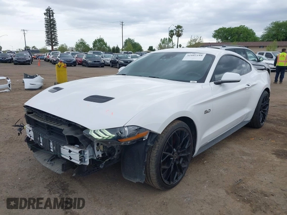 2021 Ford Mustang GT z VIN 1FA6P8CF7M5110160, wystawiony jako IAAI lot #41885188 z przebiegiem 75 799 mil mil oraz . Historia ofert i sprzedaży dostępna na DreamBid. Obrazek 18.