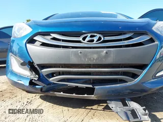 2014 Hyundai Elantra GT with VIN KMHD35LHXEU230812, listed as a IAAI auction lot 41855509 with 122,729 mi miles. Bid and sale history available at carsss.com. Image 6.