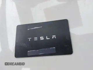 2022 Tesla Model S Plaid with VIN 5YJSA1E64NF479959, listed as a IAAI auction lot 41057673 with 27,203 mi miles and . Bid and sale history available at DreamBid. Image 9.