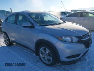 2016 Honda HR-V LX with VIN 3CZRU6H32GM732807, listed as a IAAI auction lot 41522896 with 136,074 mi miles. Bid and sale history available at carsss.com. Image 1.