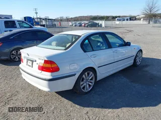 2002 BMW 3 Series 325i with VIN WBAET37492NG77657, listed as a IAAI auction lot 41691705 with 163,700 mi miles. Bid and sale history available at carsss.com. Image 4.
