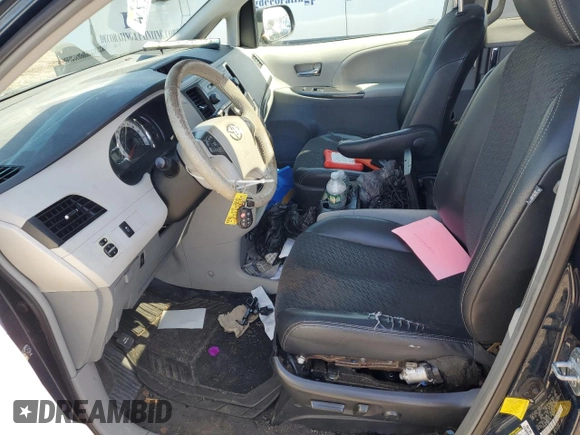 2012 Toyota Sienna SE with VIN 5TDXK3DC7CS251937, listed as a Copart auction lot 52339205 with 219,797 mi miles and Salvage Title. Bid and sale history available at carsss.com. Image 7.