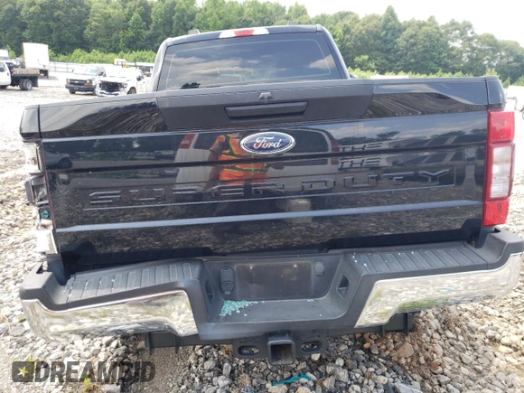 2020 Ford F-250 XL with VIN 1FT8W2BTXLEE30615, listed as a Copart auction lot 60626295 with 142,318 mi miles and Salvage title. Bid and sale history available at DreamBid. Image 6.