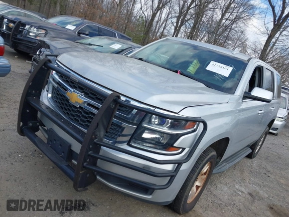 2017 Chevrolet Tahoe Commercial with VIN 1GNLCDECXHR238788, listed as a IAAI auction lot 41718161 with 129,880 mi miles and . Bid and sale history available at DreamBid. Image 2.