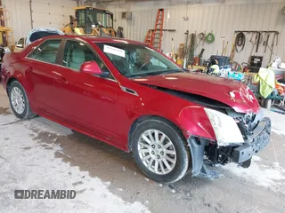 2012 Cadillac CTS Luxury z VIN 1G6DG5E5XC0122855, wystawiony jako IAAI lot #41942360 z przebiegiem 246 820 mil mil oraz . Historia ofert i sprzedaży dostępna na DreamBid. Obrazek 1.