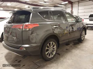 2018 Toyota RAV4 Limited with VIN JTMDFREV6JJ258429, listed as a IAAI auction lot 41678423 with 60,564 mi miles. Bid and sale history available at carsss.com. Image 4.