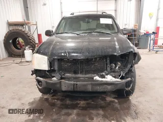 2005 GMC Envoy SLT with VIN 1GKDT13S452349125, listed as a IAAI auction lot 41148381 with 224,049 mi miles. Bid and sale history available at carsss.com. Image 6.
