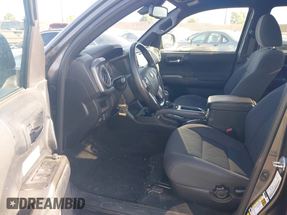 2019 Toyota Tacoma SR with VIN 3TMCZ5AN7KM251625, listed as a IAAI auction lot 42527478 with 45,689 mi miles and . Bid and sale history available at DreamBid. Image 5.
