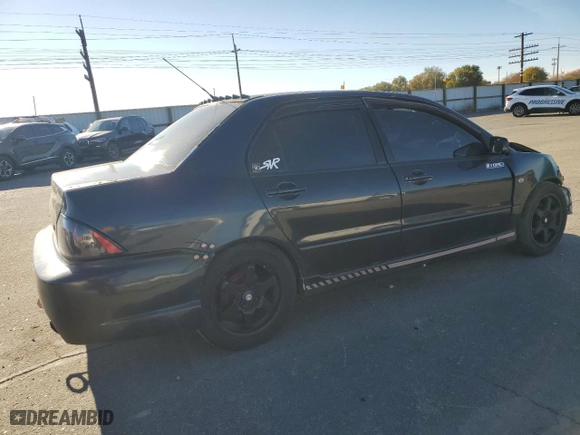 2002 Mitsubishi Lancer OZ-Rally with VIN JA3AJ86E82U024883, listed as a Copart auction lot 79145654 with 170,778 mi miles and Salvage Title. Bid and sale history available at carsss.com. Image 3.