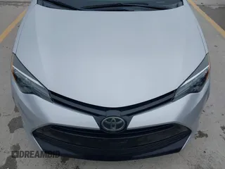 2018 Toyota Corolla L z VIN 5YFBURHE7JP822870, wystawiony jako IAAI lot #42318344 z przebiegiem 118 519 mil mil oraz . Historia ofert i sprzedaży dostępna na DreamBid. Obrazek 6.
