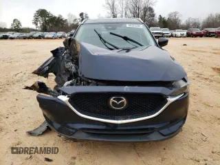 2019 Mazda CX-5 Grand Touring with VIN JM3KFADM0K1596256, listed as a Copart auction lot 86323594 with 118,853 mi miles and Salvage title. Bid and sale history available at DreamBid. Image 5.
